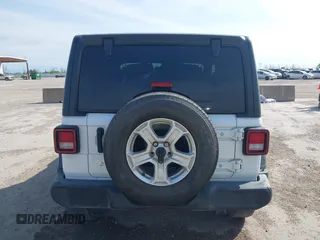 2020 Jeep Wrangler Sport S с VIN 1C4GJXAG3LW275413, выставлен на аукционе IAAI как лот 41884921 с пробегом 63 727 миль миль и . История ставок и продаж доступна на DreamBid. Изображение 17.
