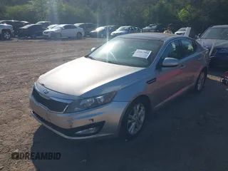 2013 Kia Optima EX z VIN 5XXGN4A76DG200422, wystawiony jako IAAI lot #42067904 z przebiegiem 278 808 mil mil oraz . Historia ofert i sprzedaży dostępna na DreamBid. Obrazek 2.