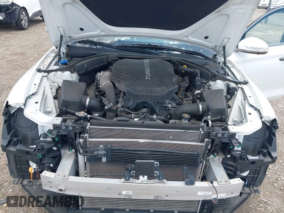 2021 Genesis G70 3.3T with VIN KMTG34LEXMU076278, listed as a IAAI auction lot 41976406 with 44,684 mi miles and . Bid and sale history available at DreamBid. Image 10.