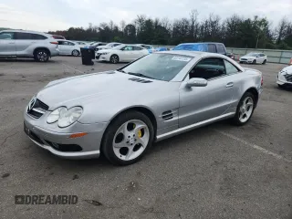 2005 Mercedes-Benz SL 500 with VIN WDBSK75F65F093215, listed as a Copart auction lot 63744135 with 94,645 mi miles and Salvage title. Bid and sale history available at DreamBid. Image 1.