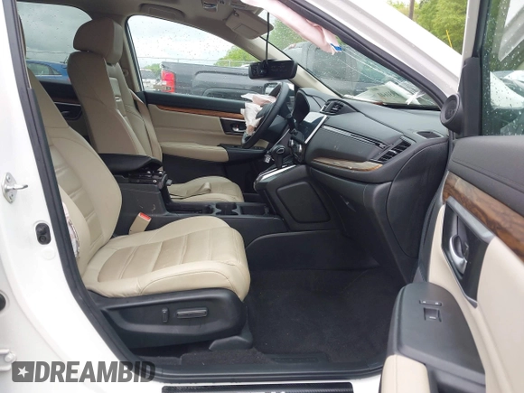 2018 Honda CR-V Touring z VIN 5J6RW1H96JL014087, wystawiony jako IAAI lot #41931640 z przebiegiem Nie podano mil oraz . Historia ofert i sprzedaży dostępna na DreamBid. Obrazek 5.