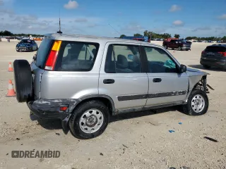2000 Honda CR-V LX with VIN JHLRD2841YC010239, listed as a Copart auction lot 69995684 with 188,885 mi miles and Salvage Title. Bid and sale history available at carsss.com. Image 3.