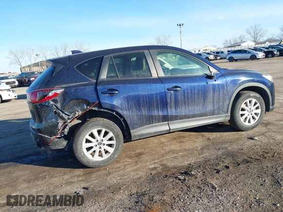 2014 Mazda CX-5 Touring with VIN JM3KE2CY8E0375009, listed as a IAAI auction lot 41420045 with 138,404 mi miles. Bid and sale history available at carsss.com. Image 4.