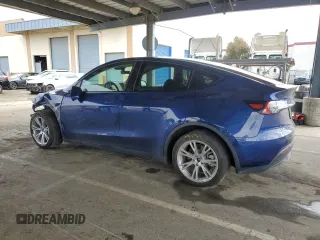 2024 Tesla Model Y Long Range with VIN 7SAYGDEE6RF025366, listed as a Copart auction lot 49328055 with 10,319 mi miles and Salvage Title. Bid and sale history available at DreamBid. Image 2.