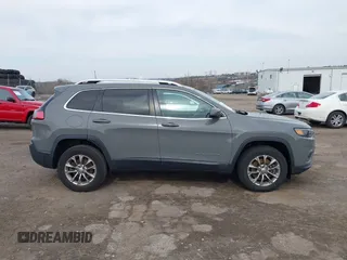 2019 Jeep Cherokee Latitude Plus with VIN 1C4PJMLX9KD445960, listed as a IAAI auction lot 41817194 with 99,194 mi miles and . Bid and sale history available at DreamBid. Image 13.