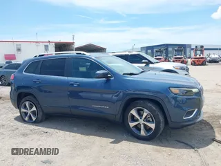 2019 Jeep Cherokee Limited z VIN 1C4PJLDB9KD454574, wystawiony jako IAAI lot #42559910 z przebiegiem 52 345 mil mil oraz . Historia ofert i sprzedaży dostępna na DreamBid. Obrazek 13.