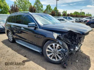2014 Mercedes-Benz GL 450 с VIN 4JGDF7CE8EA300723, выставлен на аукционе Copart как лот 65130565 с пробегом 109 591 миль миль и Списание • Salvage title. История ставок и продаж доступна на DreamBid. Изображение 4.