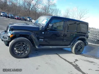 2023 Jeep Wrangler 4xe Sahara with VIN 1C4JJXP62PW613040, listed as a IAAI auction lot 41489171 with 36,818 mi miles. Bid and sale history available at carsss.com. Image 15.