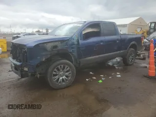 2017 Nissan Titan Platinum Reserve z VIN 1N6BA1F40HN569996, wystawiony jako Copart lot #55887505 z przebiegiem 93 488 mil mil oraz Szkoda całkowita • Salvage title. Historia ofert i sprzedaży dostępna na DreamBid. Obrazek 1.