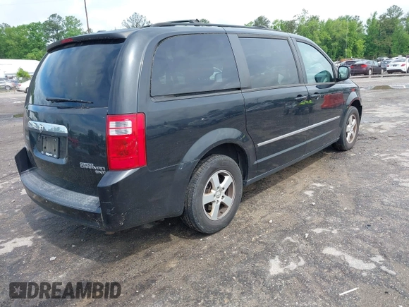 2010 Dodge Grand Caravan SXT with VIN 2D4RN5D11AR459864, listed as a IAAI auction lot 42197818 with 149,553 mi miles and . Bid and sale history available at DreamBid. Image 4.