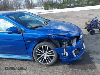 2017 Mitsubishi Lancer ES with VIN JA32V2FW1HU001811, listed as a IAAI auction lot 41378932 with 130,316 mi miles. Bid and sale history available at carsss.com. Image 6.