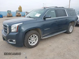 2019 GMC Yukon XL SLT with VIN 1GKS2GKC0KR345860, listed as a IAAI auction lot 40727072 with 127,568 mi miles and . Bid and sale history available at carsss.com. Image 18.