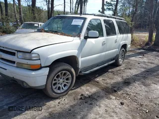 2004 Chevrolet Suburban Z71 with VIN 3GNFK16Z54G314817, listed as a IAAI auction lot 41613299 with 360,310 mi miles. Bid and sale history available at carsss.com. Image 2.
