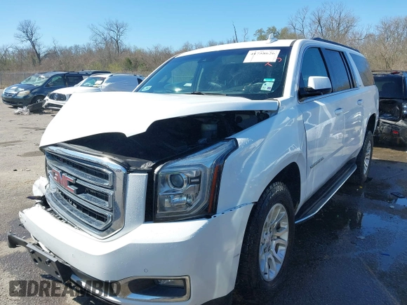 2019 GMC Yukon XL SLT with VIN 1GKS1GKC0KR330715, listed as a IAAI auction lot 41758626 with 134,641 mi miles. Bid and sale history available at carsss.com. Image 2.