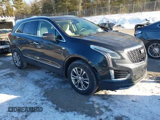 2021 Cadillac XT5 AWD Premium Luxury with VIN 1GYKNDRS2MZ121484, listed as a IAAI auction lot 41346958 with 39,635 mi miles. Bid and sale history available at carsss.com. Image 1.