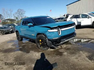 2022 Rivian R1T Launch Edition z VIN 7FCTGAAL7NN000539, wystawiony jako Copart lot #87811245 z przebiegiem Nie podano mil oraz Szkody całkowita. Historia ofert i sprzedaży dostępna na DreamBid. Obrazek 14.
