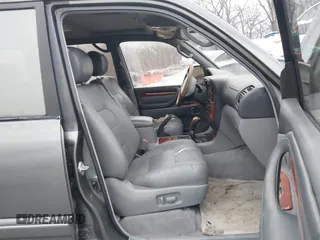 2002 Lexus LX 470 with VIN JTJHT00W923515897, listed as a IAAI auction lot 41155492 with 244,619 mi miles. Bid and sale history available at carsss.com. Image 5.