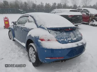 2019 Volkswagen Beetle S with VIN 3VWFD7ATXKM719544, listed as a IAAI auction lot 41565506 with 21,734 mi miles. Bid and sale history available at carsss.com. Image 3.