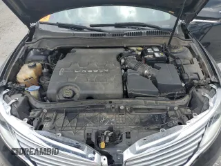 2016 Lincoln MKZ z VIN 3LN6L2GK1GR602447, wystawiony jako Copart lot #54505425 z przebiegiem 225 923 mil mil oraz Szkody całkowita. Historia ofert i sprzedaży dostępna na DreamBid. Obrazek 11.