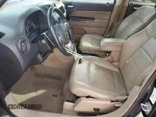 2011 Jeep Patriot Latitude X with VIN 1J4NF4GB4BD167258, listed as a Copart auction lot 52239874 with 157,144 mi miles and Salvage Title. Bid and sale history available at DreamBid. Image 7.