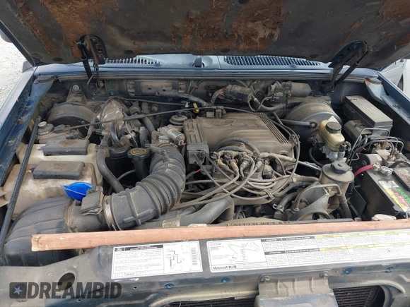1999 Mercury Mountaineer z VIN 4M2DU52P3XUJ37055, wystawiony jako IAAI lot #41940577 z przebiegiem 218 702 mil mil oraz . Historia ofert i sprzedaży dostępna na DreamBid. Obrazek 10.