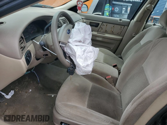 2004 Ford Taurus SES with VIN 1FAFP55U94A116527, listed as a Copart auction lot 58208575 with Not provided miles and Clean title. Bid and sale history available at DreamBid. Image 7.