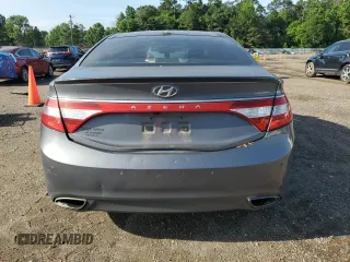 2013 Hyundai Azera с VIN KMHFH4JG4DA323839, выставлен на аукционе Copart как лот 58860835 с пробегом 180 982 миль миль и Списание • Salvage title. История ставок и продаж доступна на DreamBid. Изображение 6.