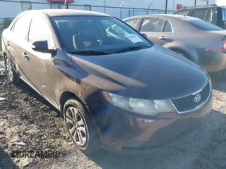 2010 Kia Forte EX with VIN KNAFU4A26A5306448, listed as a IAAI auction lot 42048677 with 172,095 mi miles. Bid and sale history available at carsss.com. Image 1.