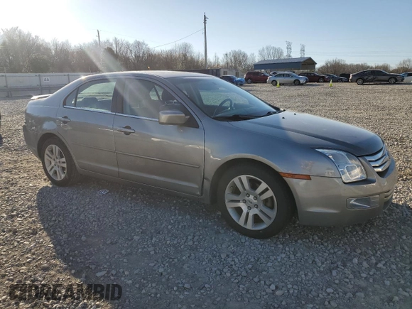 2008 Ford Fusion SEL with VIN 3FAHP08128R112781, listed as a Copart auction lot 48602325 with 142,174 mi miles and Salvage Title. Bid and sale history available at carsss.com. Image 4.