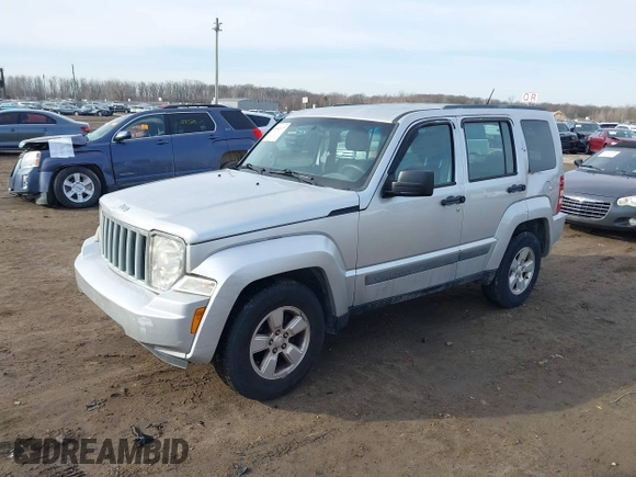 2012 Jeep Liberty Sport with VIN 1C4PJMAKXCW133658, listed as a IAAI auction lot 41814977 with 128,328 mi miles and . Bid and sale history available at carsss.com. Image 2.
