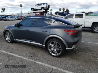 2023 Genesis GV60 Performance z VIN KMUKEDTB7PU011754, wystawiony jako Copart lot #39865424 z przebiegiem 5915 mil mil oraz . Historia ofert i sprzedaży dostępna na DreamBid. Obrazek 2.