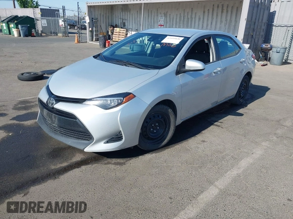 2018 Toyota Corolla L with VIN 2T1BURHE8JC079085, listed as a IAAI auction lot 42495026 with 376,657 mi miles and . Bid and sale history available at DreamBid. Image 18.