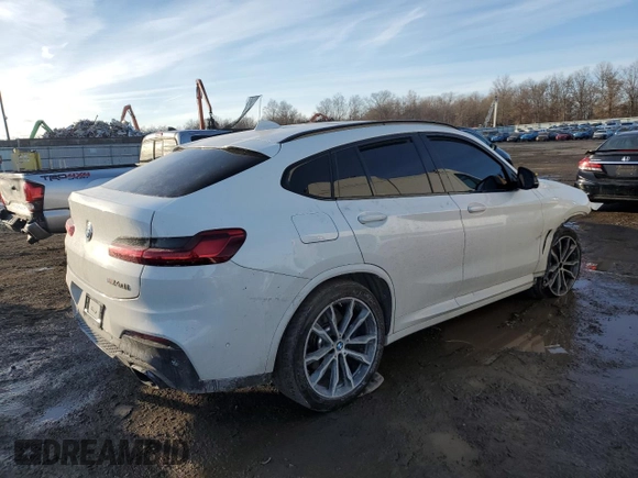 2021 BMW X4 M40i with VIN 5UX2V5C02M9E10918, listed as a Copart auction lot 42954645 with Not provided miles and Salvage title. Bid and sale history available at DreamBid. Image 3.