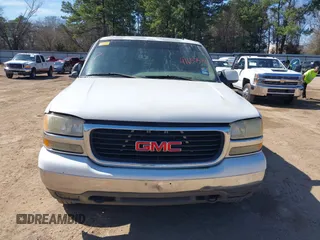 2002 GMC Yukon SLT with VIN 1GKEC13Z02J244875, listed as a IAAI auction lot 41657514 with 329,288 mi miles. Bid and sale history available at carsss.com. Image 6.