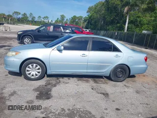 2005 Toyota Camry LE with VIN 4T1BE30KX5U589356, listed as a IAAI auction lot 42471176 with 142,153 mi miles and . Bid and sale history available at DreamBid. Image 14.