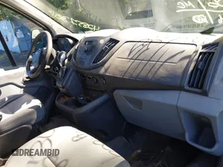 2016 Ford Transit Cargo with VIN 1FTYR1ZM2GKB06257, listed as a IAAI auction lot 42851308 with 239,006 mi miles and . Bid and sale history available at DreamBid. Image 5.