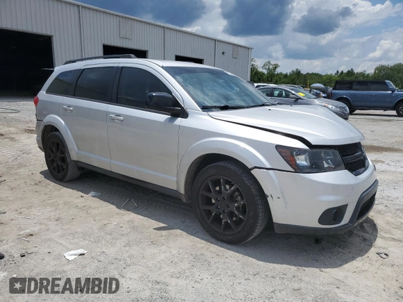 2013 Dodge Journey SXT with VIN 3C4PDCBG4DT685370, listed as a Copart auction lot 61353335 with 193,973 mi miles and Salvage title. Bid and sale history available at DreamBid. Image 4.