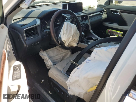 2020 Lexus RX with VIN 2T2HGMDA2LC050011, listed as a Copart auction lot 50695395 with 75,567 mi miles and Salvage Title. Bid and sale history available at carsss.com. Image 8.