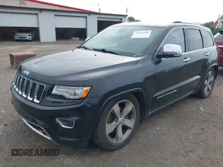 2015 Jeep Grand Cherokee High Altitude with VIN 1C4RJFCGXFC604663, listed as a IAAI auction lot 42816306 with 117,467 mi miles and . Bid and sale history available at DreamBid. Image 2.