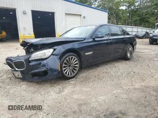2013 BMW 7 Series 740i with VIN WBAYA6C55DD143600, listed as a Copart auction lot 74594974 with 149,846 mi miles and Salvage Title. Bid and sale history available at carsss.com. Image 1.