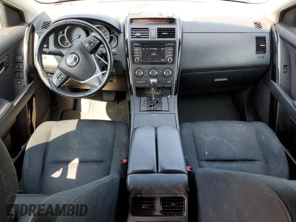 2015 Mazda CX-9 Sport z VIN JM3TB3BV9F0462607, wystawiony jako Copart lot #70601884 z przebiegiem 94 859 mil mil oraz Szkoda całkowita • Salvage title. Historia ofert i sprzedaży dostępna na DreamBid. Obrazek 8.