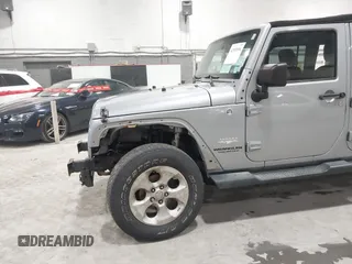 2014 Jeep Wrangler Unlimited Sahara with VIN 1C4BJWEG5EL164350, listed as a IAAI auction lot 42018586 with 113,222 mi miles. Bid and sale history available at carsss.com. Image 6.