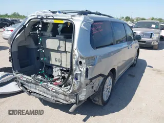2012 Toyota Sienna XLE AAS with VIN 5TDYK3DC7CS185555, listed as a IAAI auction lot 42013098 with 140,969 mi miles. Bid and sale history available at carsss.com. Image 4.
