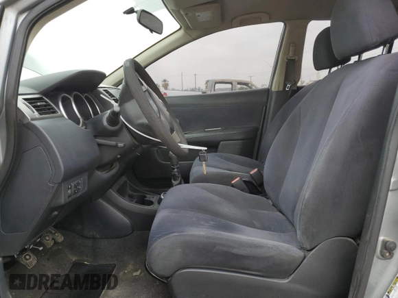 2007 Nissan Versa 1.8 S with VIN 3N1BC13E47L357890, listed as a Copart auction lot 50327045 with 188,445 mi miles and Salvage Title. Bid and sale history available at carsss.com. Image 7.