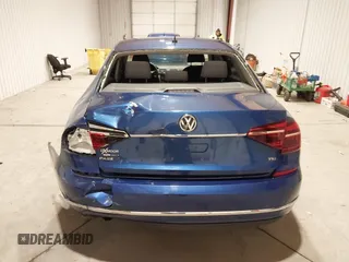 2017 Volkswagen Passat S z VIN 1VWAT7A38HC013602, wystawiony jako IAAI lot #41218616 z przebiegiem 77 497 mil mil oraz . Historia ofert i sprzedaży dostępna na DreamBid. Obrazek 16.