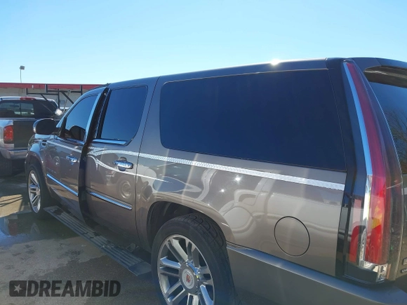 2011 Cadillac Escalade ESV Platinum Edition z VIN 1GYS4KEFXBR253776, wystawiony jako IAAI lot #41292093 z przebiegiem 290 220 mil mil oraz . Historia ofert i sprzedaży dostępna na DreamBid. Obrazek 14.