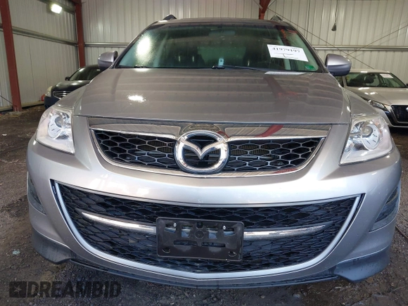 2011 Mazda CX-9 Touring with VIN JM3TB3CV6B0307358, listed as a IAAI auction lot 41979197 with 128,471 mi miles. Bid and sale history available at carsss.com. Image 6.