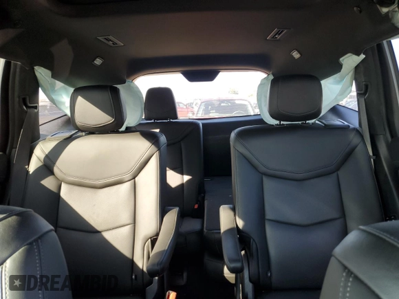 2021 Cadillac XT6 Sport with VIN 1GYKPGRS2MZ175735, listed as a Copart auction lot 88703045 with 26,902 mi miles and Salvage title. Bid and sale history available at DreamBid. Image 10.