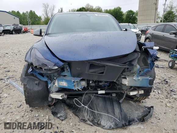 2024 Tesla Model Y Long Range с VIN 7SAYGDEE8RA226229, выставлен на аукционе Copart как лот 56722755 с пробегом Не указан миль и Списание • Salvage title. История ставок и продаж доступна на DreamBid. Изображение 5.
