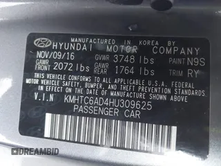 2017 Hyundai Veloster with VIN KMHTC6AD4HU309625, listed as a IAAI auction lot 41933497 with 184,632 mi miles. Bid and sale history available at carsss.com. Image 9.